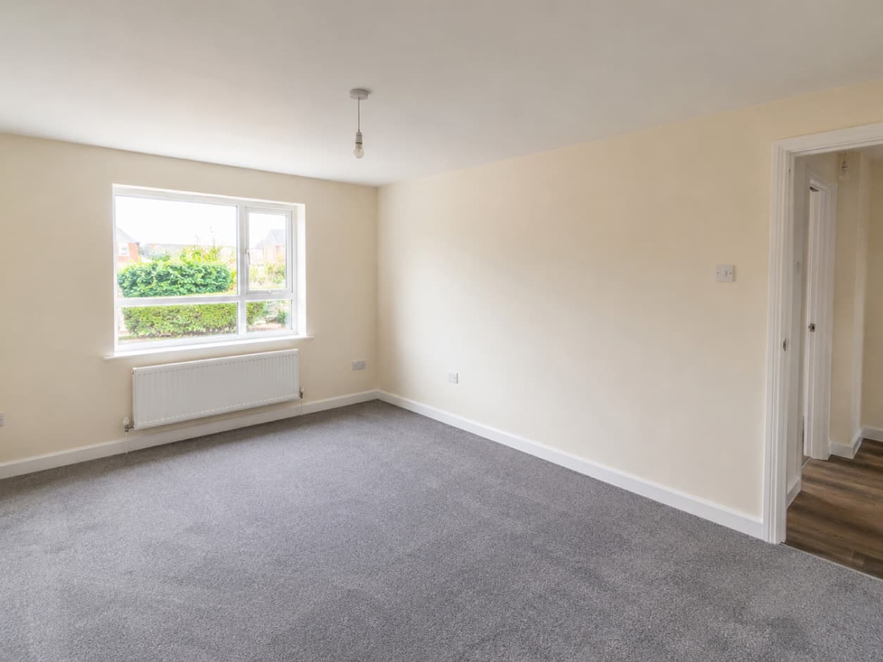 Empty living room before staging
